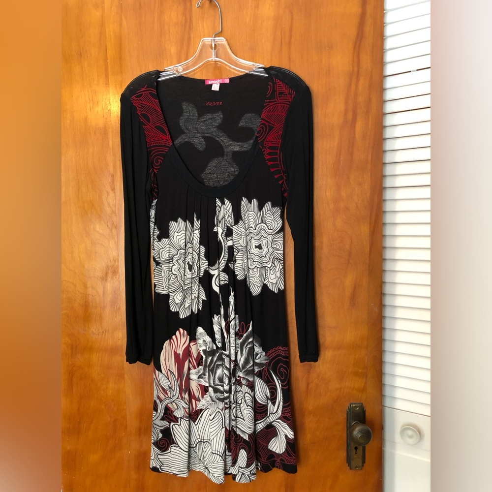 Short “Smash” dress size US small. Black and red design